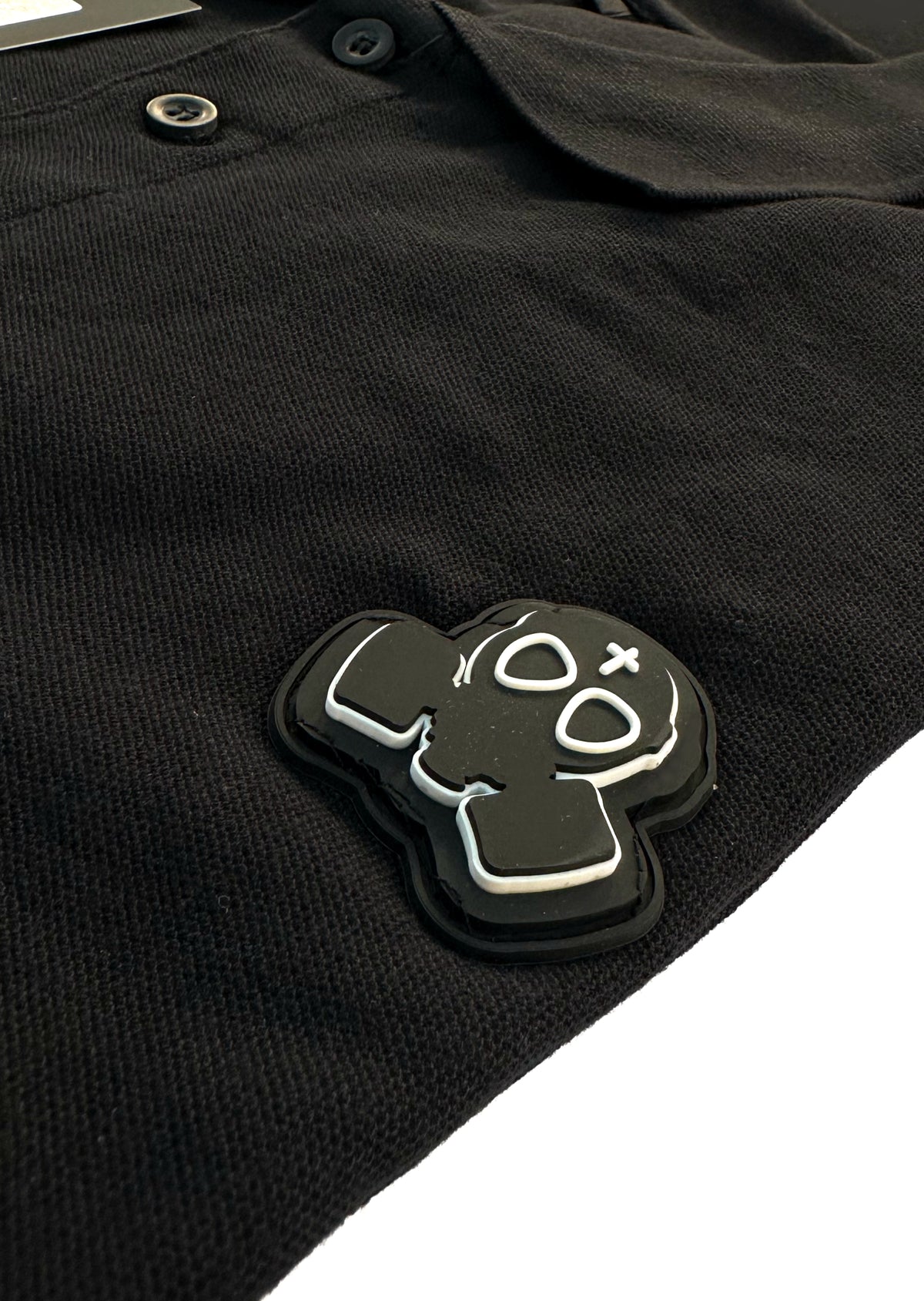 POLO CON PATCH LOGO MASK