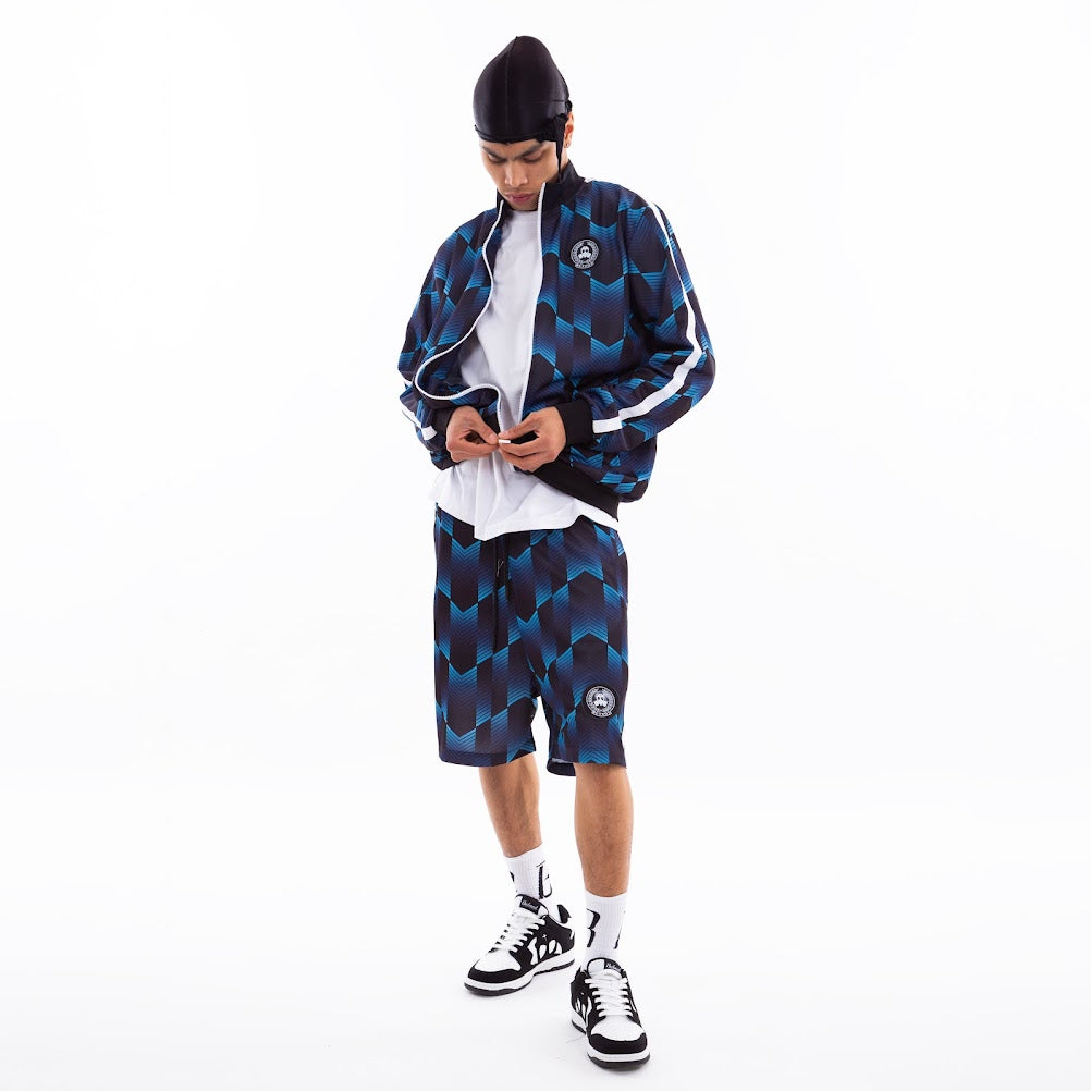 SHORT EN ACÉTATE IMPRIMÉ AVEC PATCH LOGO